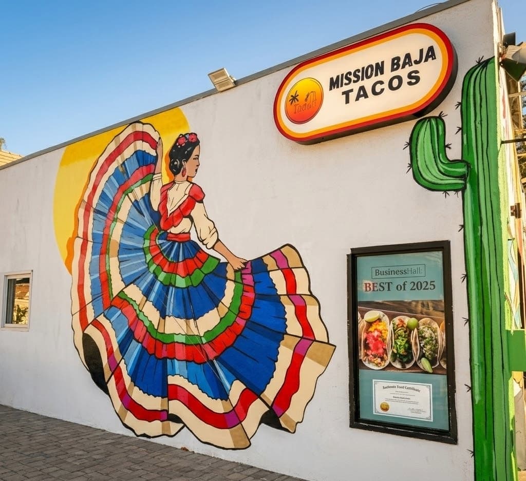 Mission Baja Tacos storefront with colorful dancer mural and Best of 2025 award